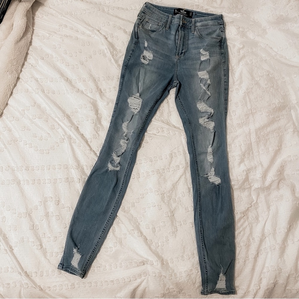 5 Long curvy high rise skinny classic stretch blue jeans. Lightly distressed.